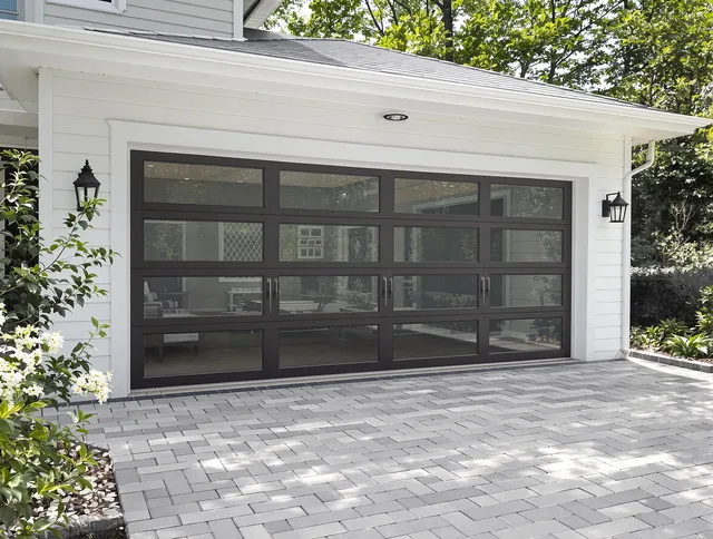 Lehigh Acres Garage Door Repair design specialist presenting custom garage door options to Lehigh Acres homeowner