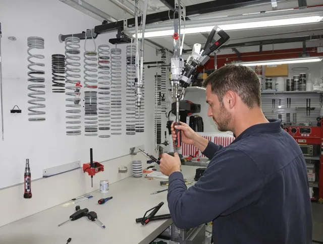Lehigh Acres Garage Door Repair safety certified technician performing precision spring replacement in Lehigh Acres